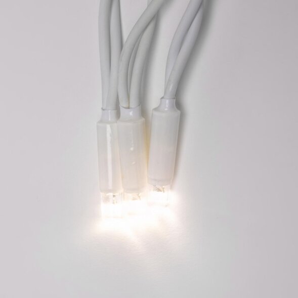 ULD-B3010-200/TWK WARMWHITE IP67 Бахрома светодиодная с эффектом мерцания, 3м. Соединяемая. 200 светодиодов. Теплый белый свет. Провод белый. TM Uniel.